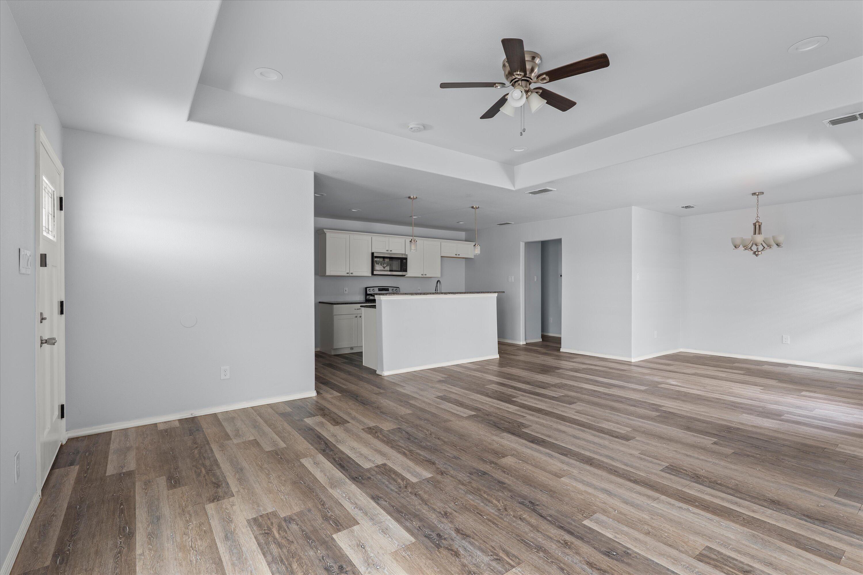 8414 11th Street Lubbock, TX 79416 - Photo 8 of 26 a view of a livingroom with a hardwood floor