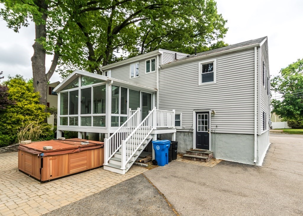 30 Kingston Road Waltham, MA 02451 - Photo 41 of 41 a view of a house with a backyard and porch