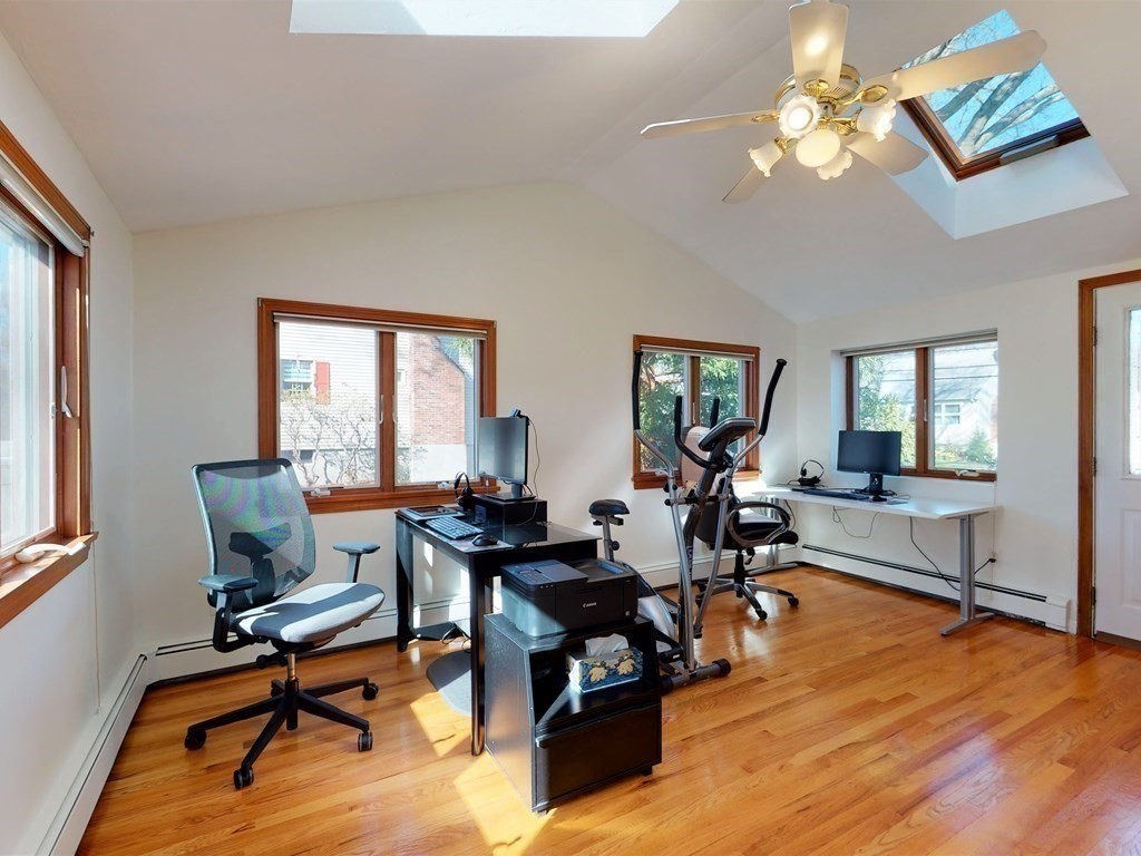 30 Kingston Road Waltham, MA 02451 - Photo 10 of 41 a living room with furniture lamps and wooden floor