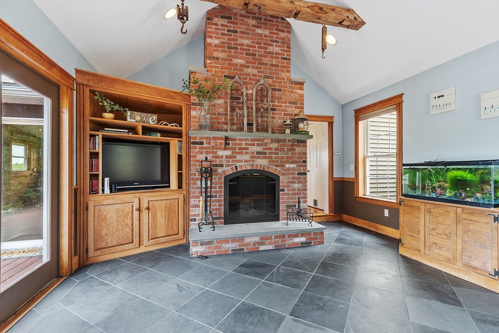 11 Syd Smith Road Westminster, MA 01473 - Photo 22 of 42 a living room with furniture and a fireplace