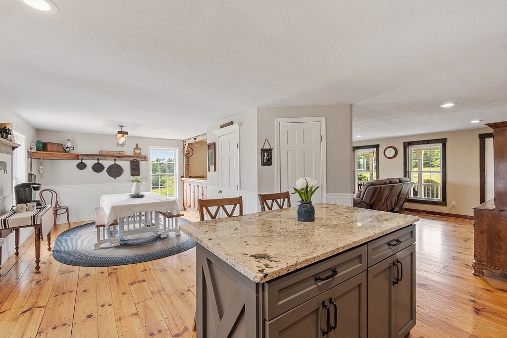11 Syd Smith Road Westminster, MA 01473 - Photo 4 of 42 a kitchen with granite countertop kitchen island stainless steel appliances a sink and cabinets
