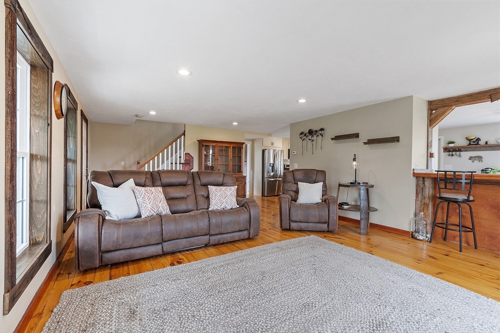 11 Syd Smith Road Westminster, MA 01473 - Photo 9 of 42 a living room with furniture and a table
