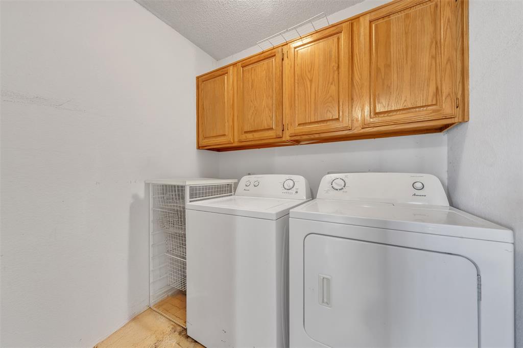 3405 Tulip Lane Rowlett, TX 75089 - Photo 23 of 36 a utility room with dryer and washer