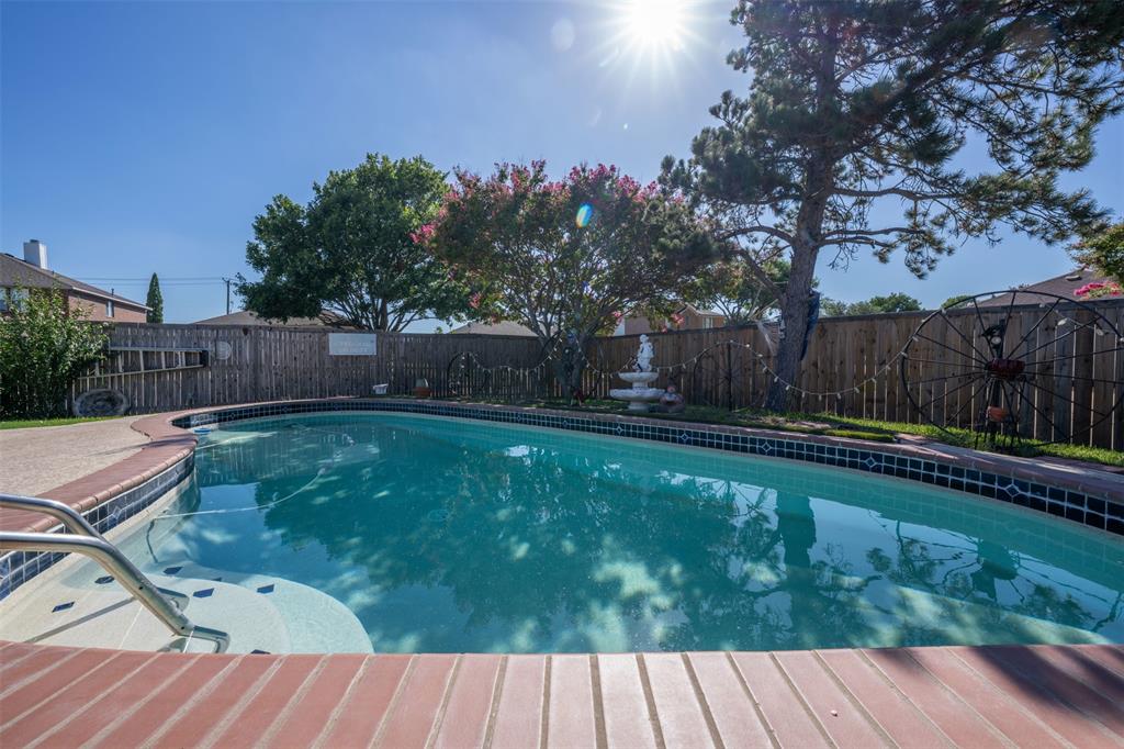 3405 Tulip Lane Rowlett, TX 75089 - Photo 33 of 36 a view of backyard with a garden and seating space