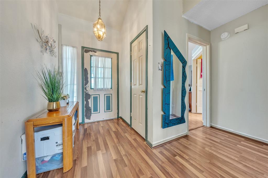 3405 Tulip Lane Rowlett, TX 75089 - Photo 34 of 36 a view of an entryway with wooden floor and door