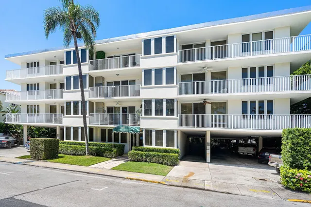 a view of an apartment with a garden and plants