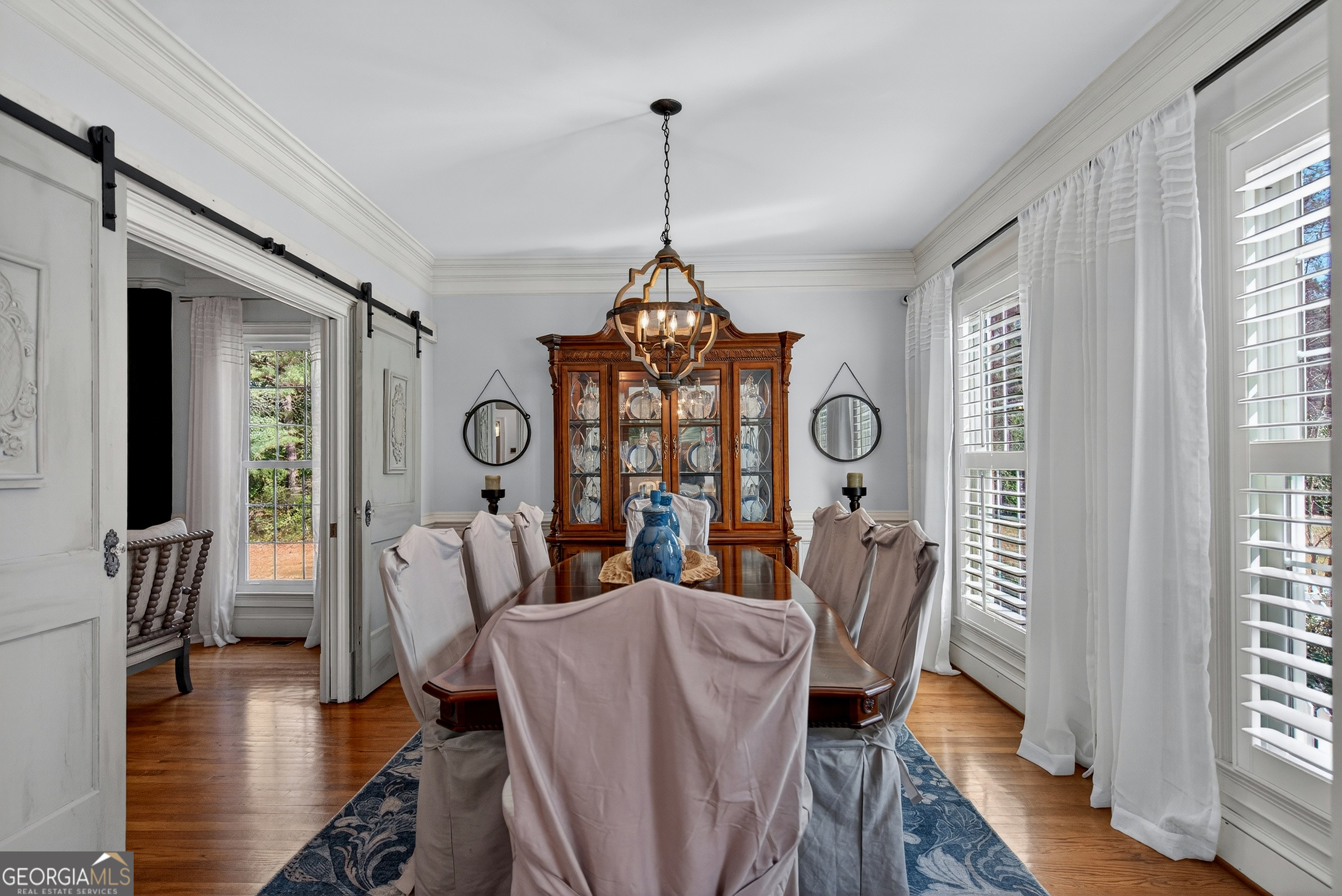 638 Cameron Mill Road LaGrange, GA 30240 - Photo 13 of 72 a view of a dining room with furniture window and wooden floor