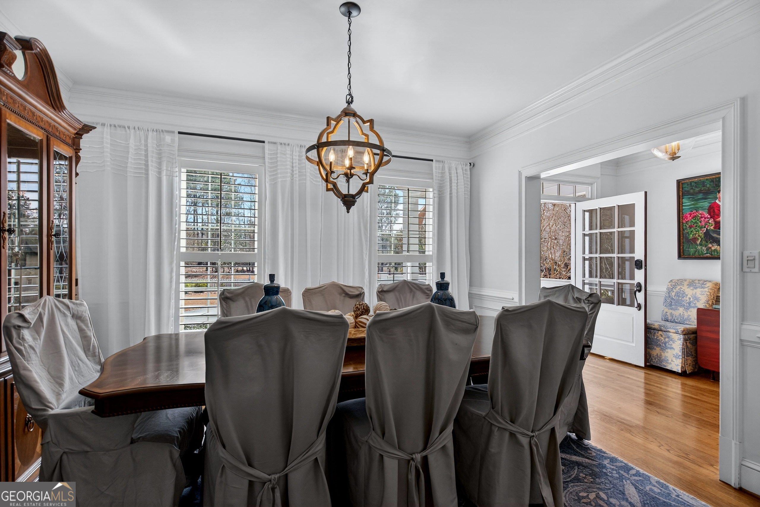 638 Cameron Mill Road LaGrange, GA 30240 - Photo 14 of 72 a view of a dining room with furniture window and wooden floor