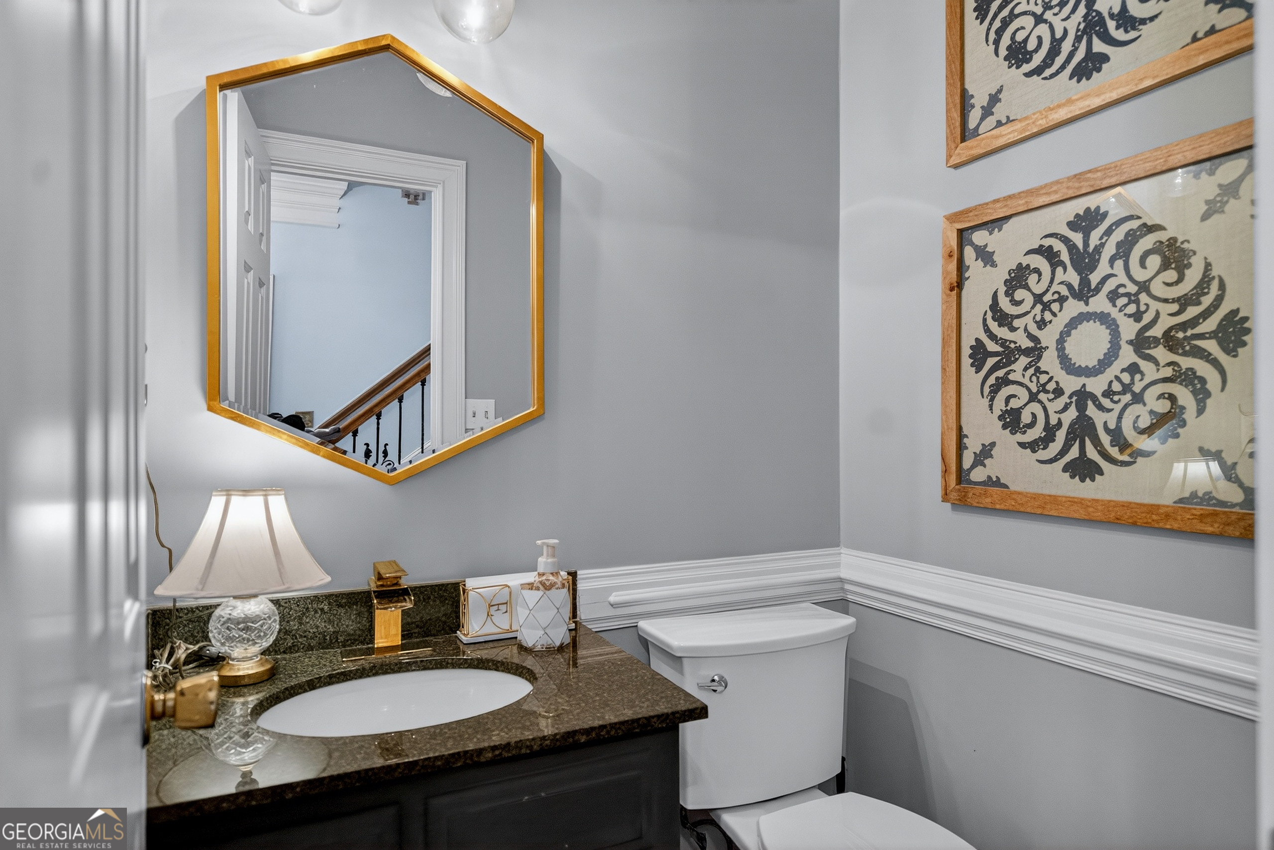 638 Cameron Mill Road LaGrange, GA 30240 - Photo 17 of 72 a bathroom with a sink toilet and mirror