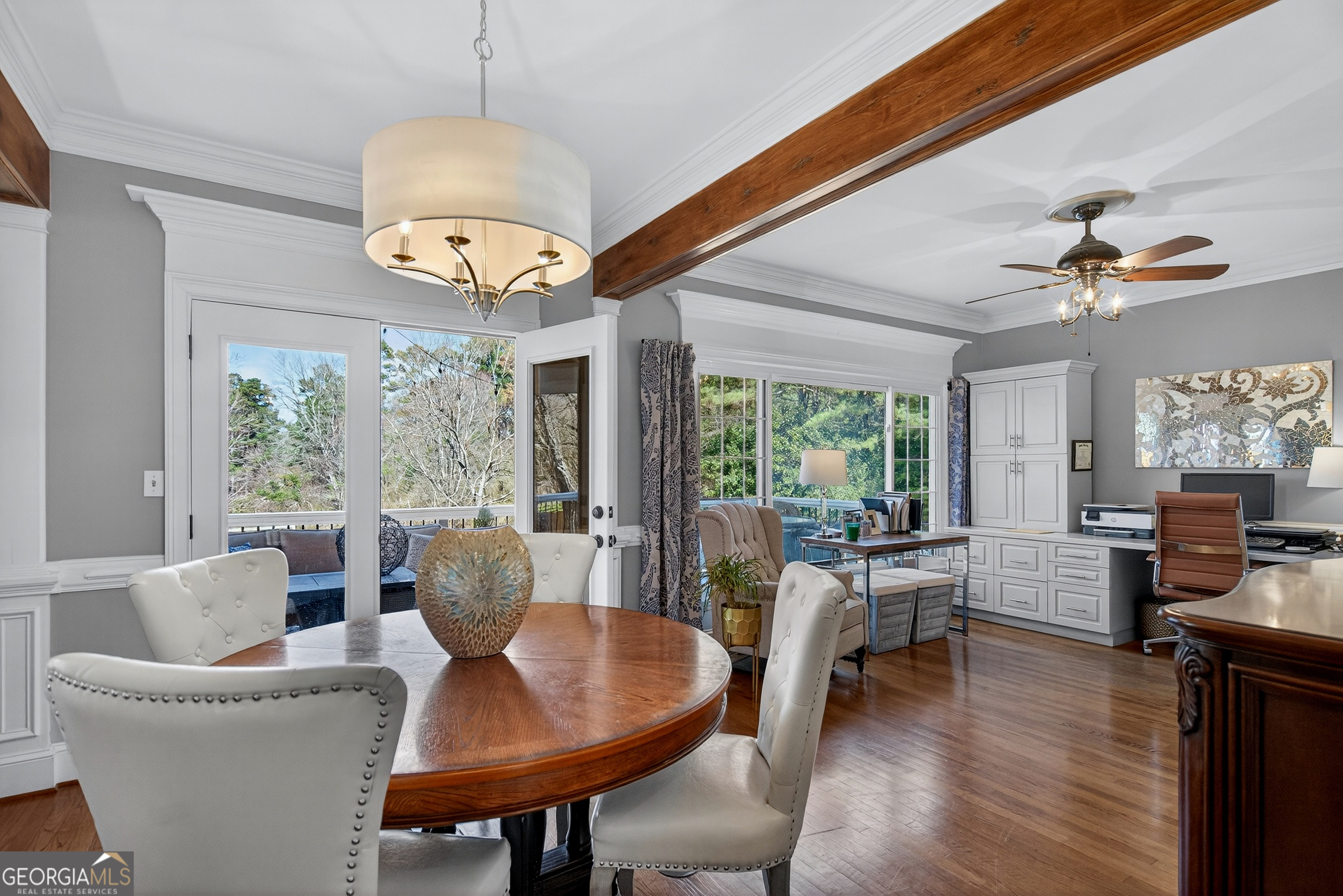 638 Cameron Mill Road LaGrange, GA 30240 - Photo 22 of 72 a view of a dining room with furniture wooden floor and chandelier