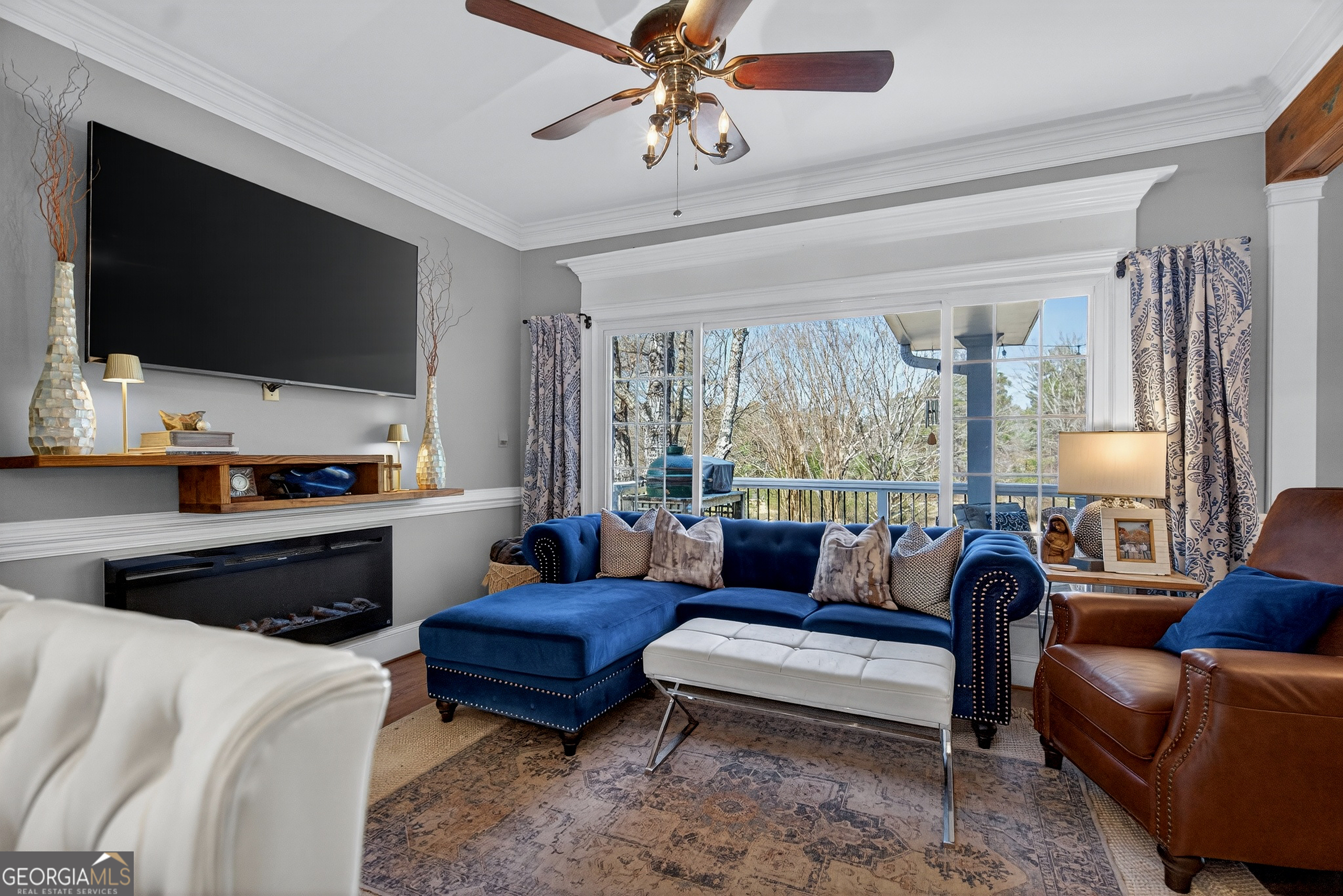 638 Cameron Mill Road LaGrange, GA 30240 - Photo 25 of 72 a living room with furniture fireplace and a flat screen tv