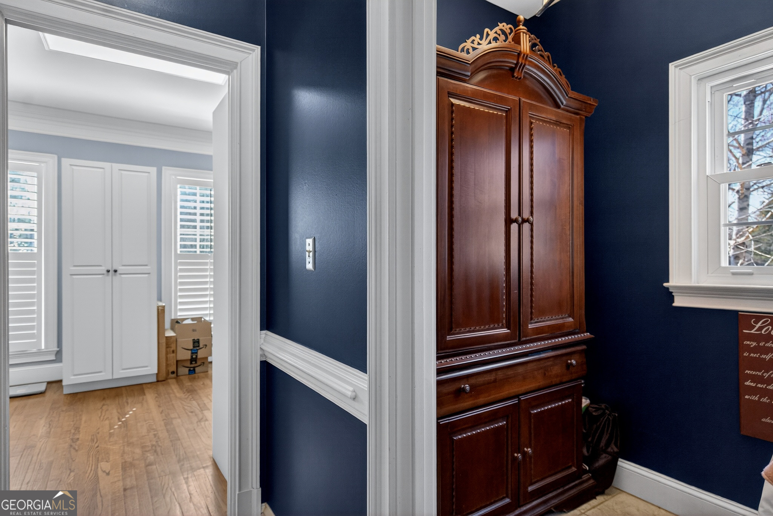 638 Cameron Mill Road LaGrange, GA 30240 - Photo 31 of 72 a view of a hallway with wooden floor and windows