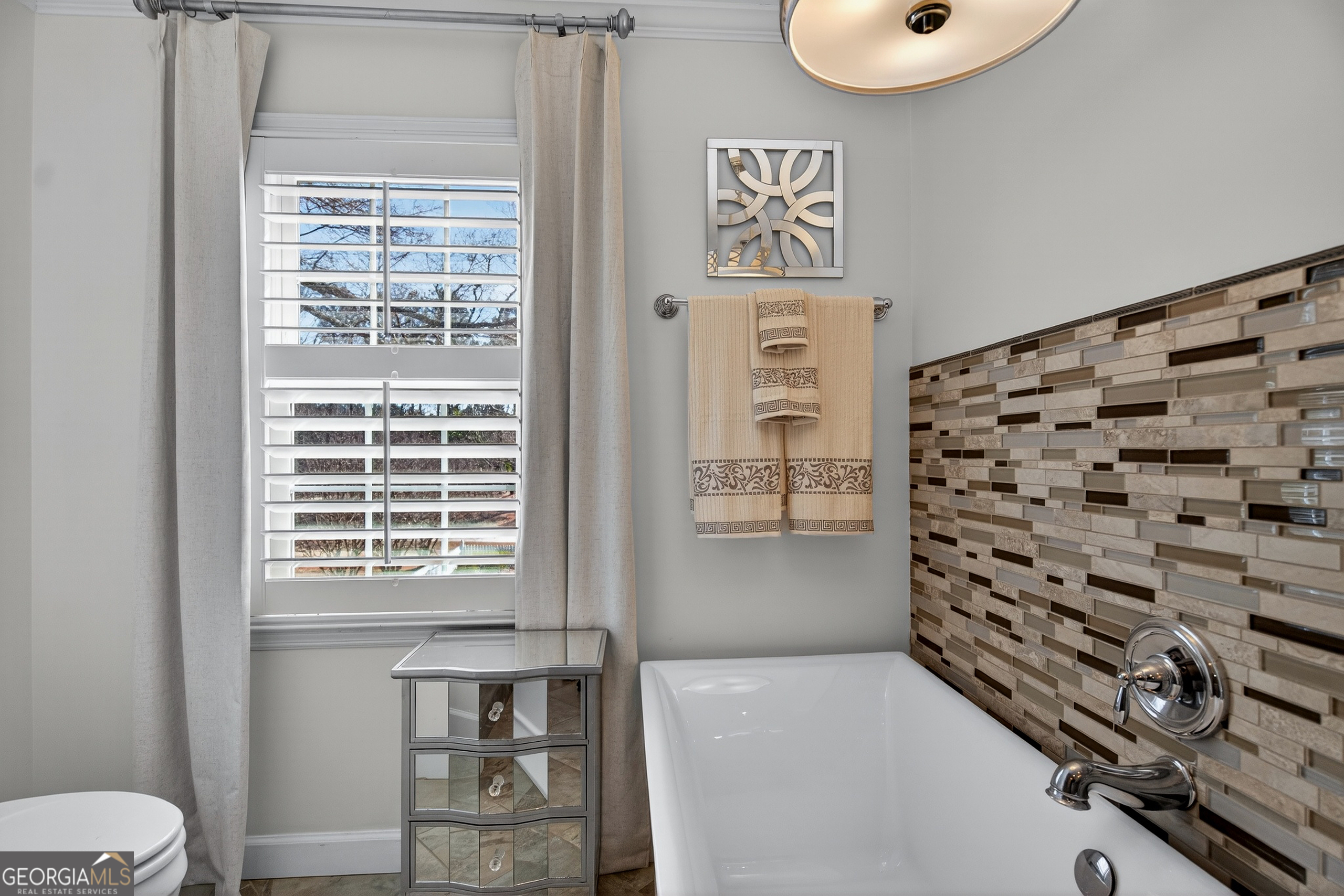 638 Cameron Mill Road LaGrange, GA 30240 - Photo 43 of 72 a bathroom with a bathtub and a shower
