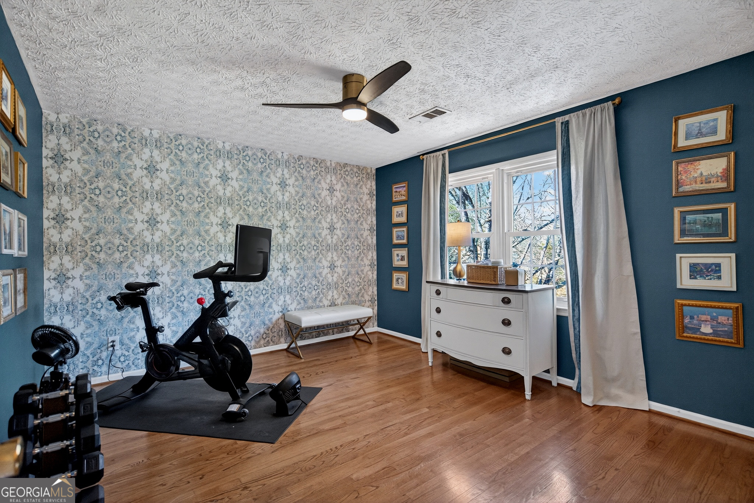 638 Cameron Mill Road LaGrange, GA 30240 - Photo 44 of 72 a view of a livingroom with furniture and a flat screen tv