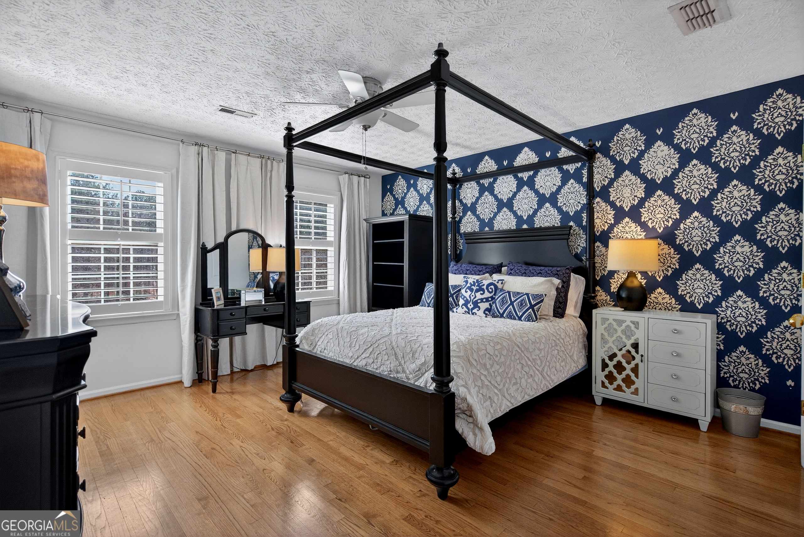 638 Cameron Mill Road LaGrange, GA 30240 - Photo 48 of 72 a bed room with a bed and a chair