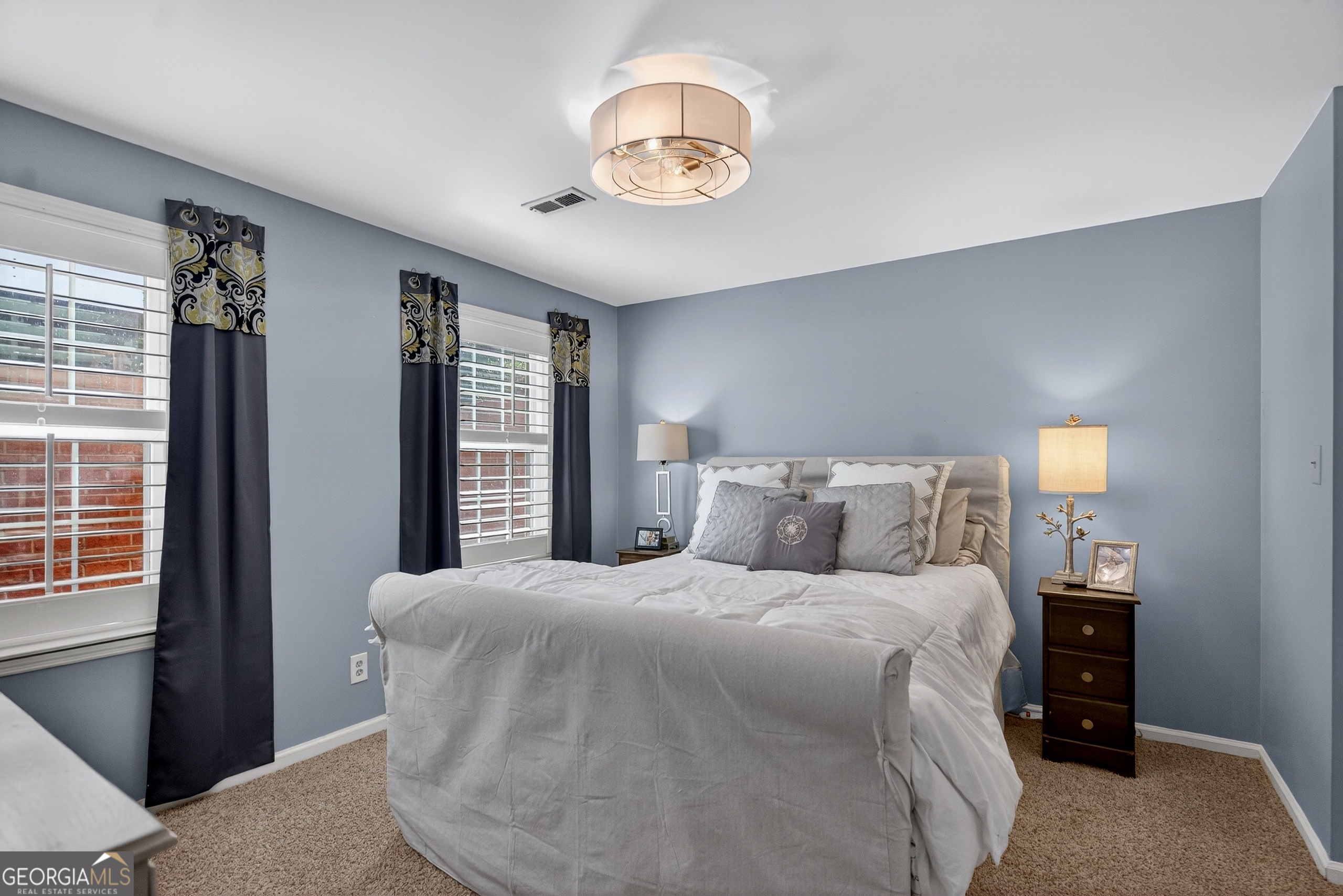 638 Cameron Mill Road LaGrange, GA 30240 - Photo 53 of 72 a bedroom with a bed and a window