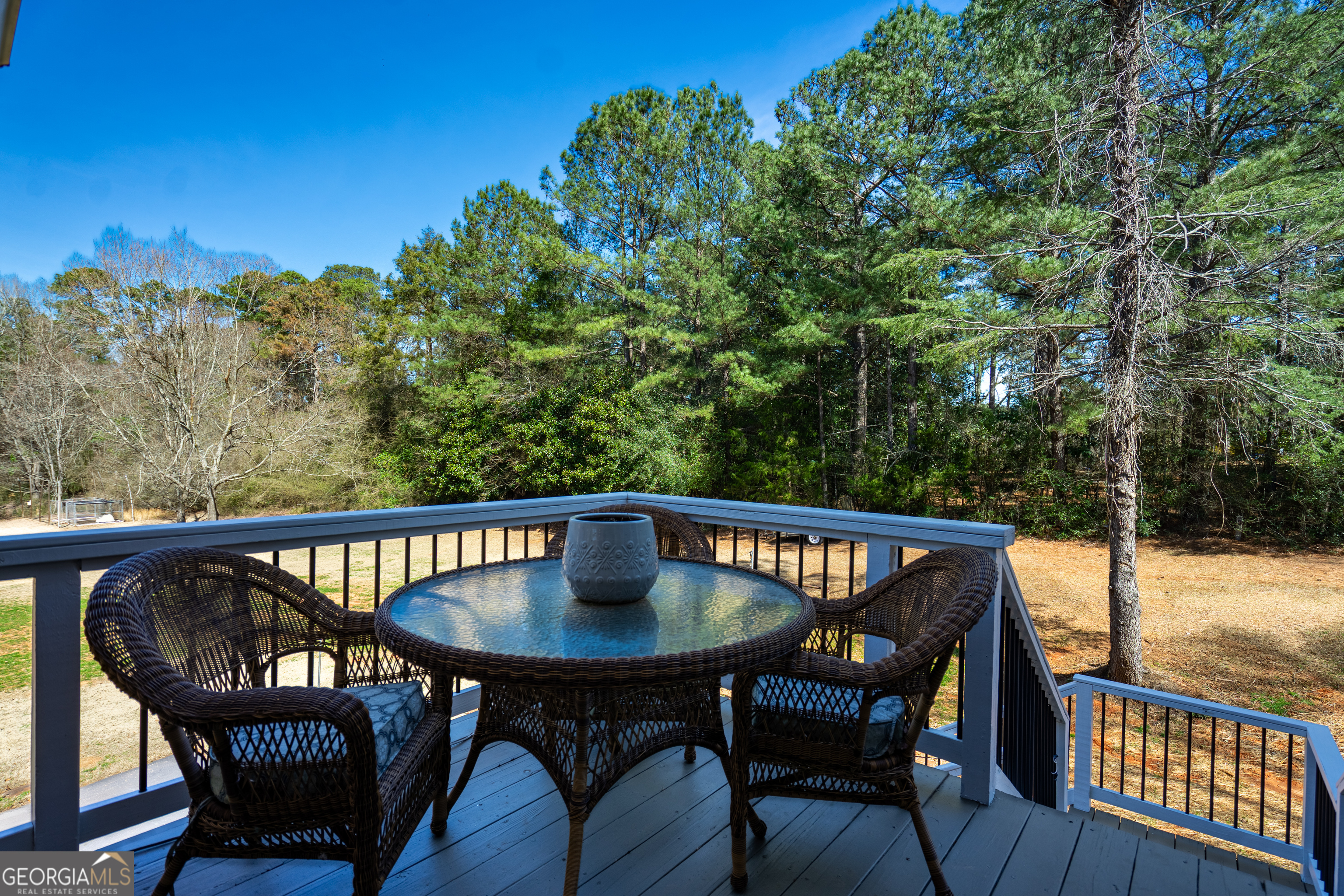 638 Cameron Mill Road LaGrange, GA 30240 - Photo 58 of 72 a view of a chairs and table on the deck