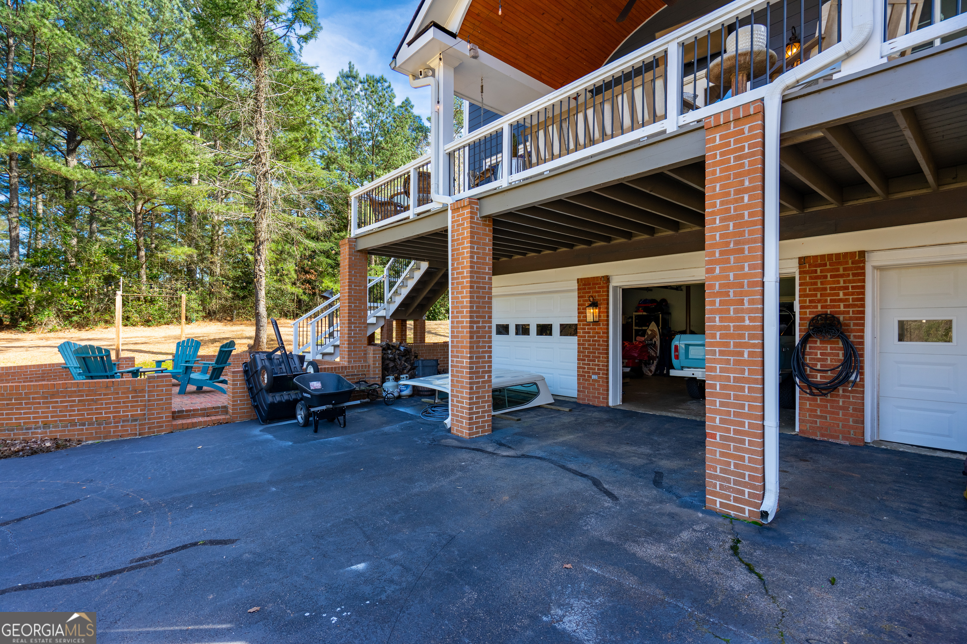 638 Cameron Mill Road LaGrange, GA 30240 - Photo 61 of 72 a view of a house with a patio and a yard