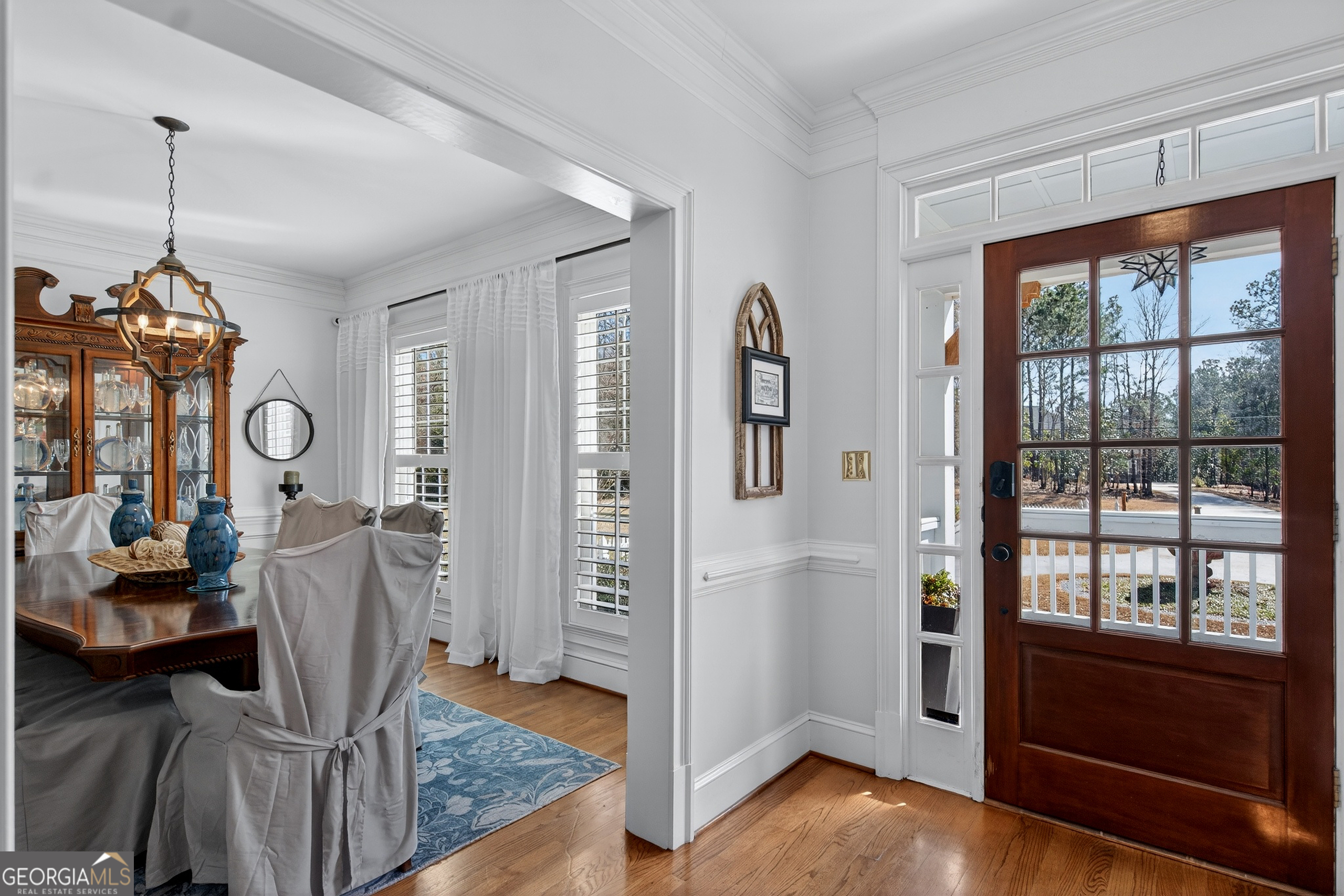 638 Cameron Mill Road LaGrange, GA 30240 - Photo 10 of 72 a view of a dining room with furniture window and wooden floor