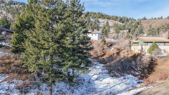 a view of a large building with a yard