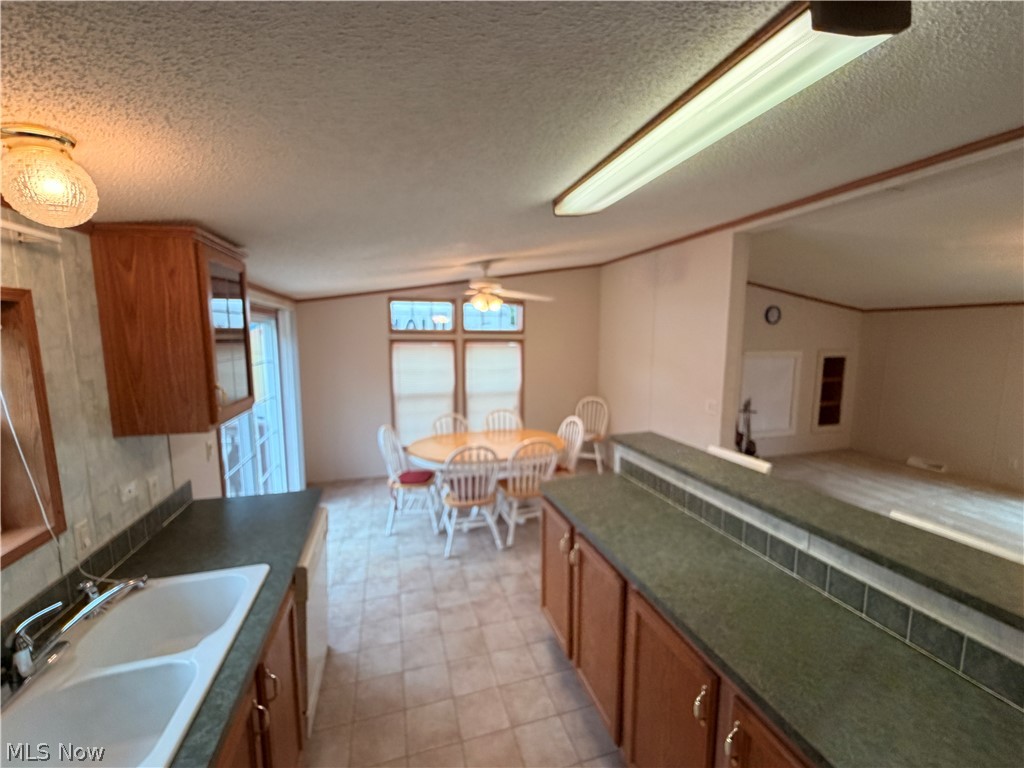 Kitchen with large island overlooking llving room