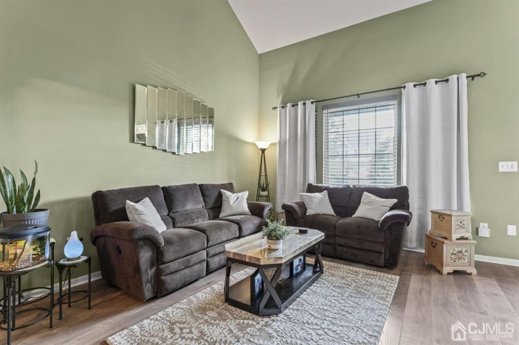 14 Reddington Drive Old Bridge, NJ 07747 - Photo 20 of 40 a living room with furniture and a potted plant