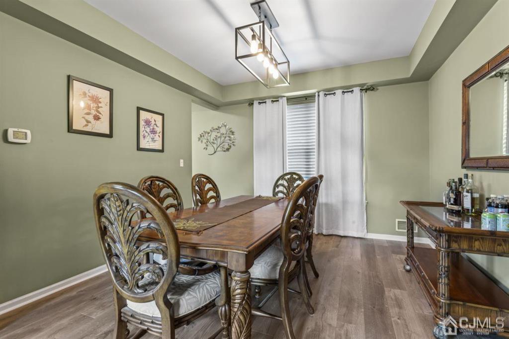 14 Reddington Drive Old Bridge, NJ 07747 - Photo 21 of 40 a view of a dining room with furniture window and wooden floor