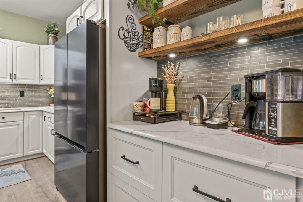 14 Reddington Drive Old Bridge, NJ 07747 - Photo 24 of 40 a kitchen with refrigerator and window