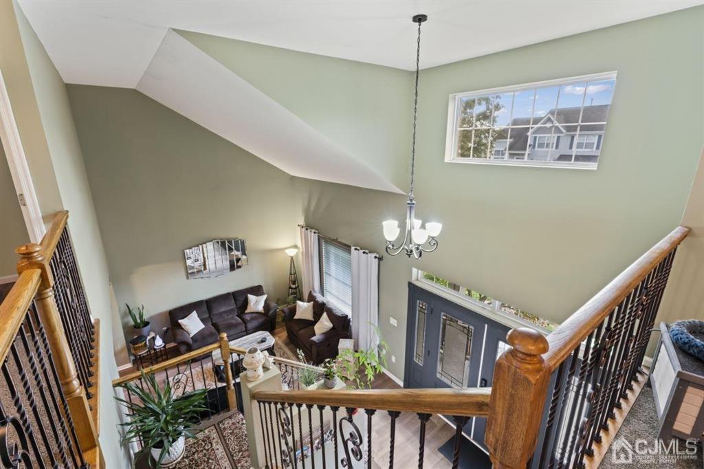 14 Reddington Drive Old Bridge, NJ 07747 - Photo 36 of 40 a view of a livingroom with furniture hardwood floor and staircase