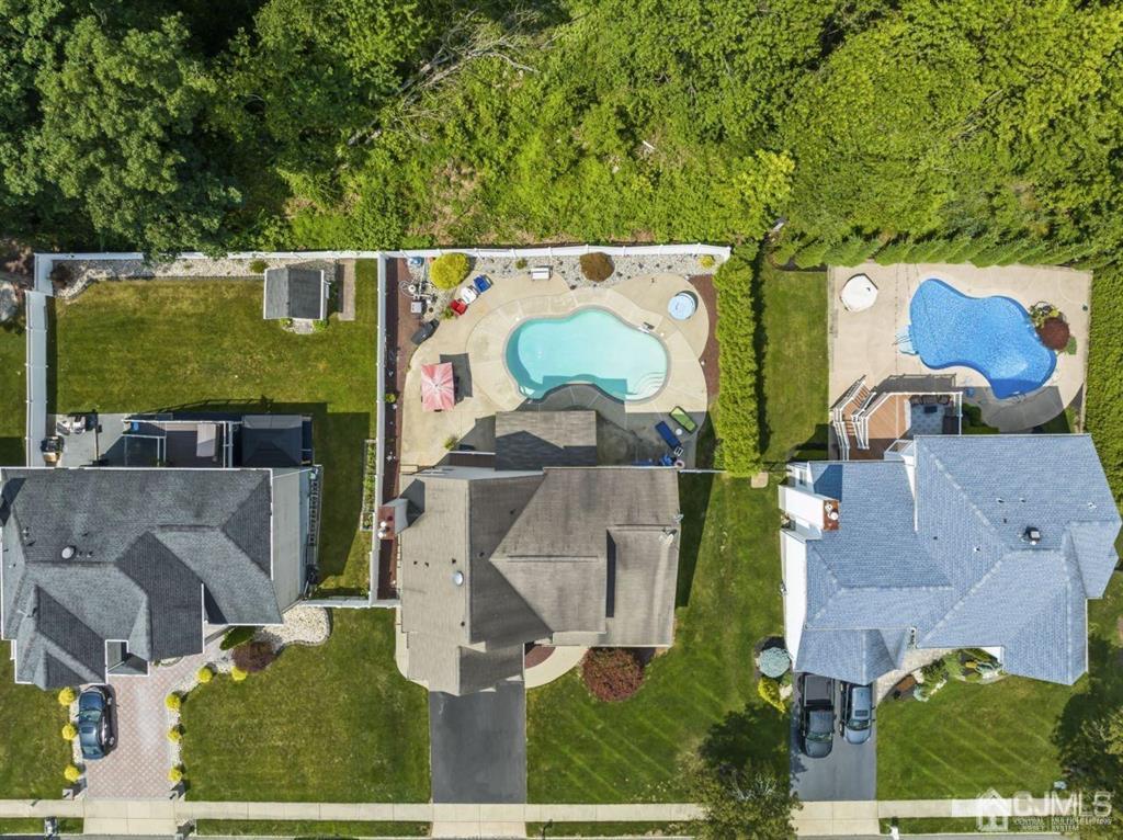 14 Reddington Drive Old Bridge, NJ 07747 - Photo 5 of 40 an aerial view of a house with a garden and lake view