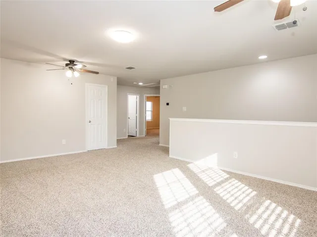 a view of a livingroom with a staircase
