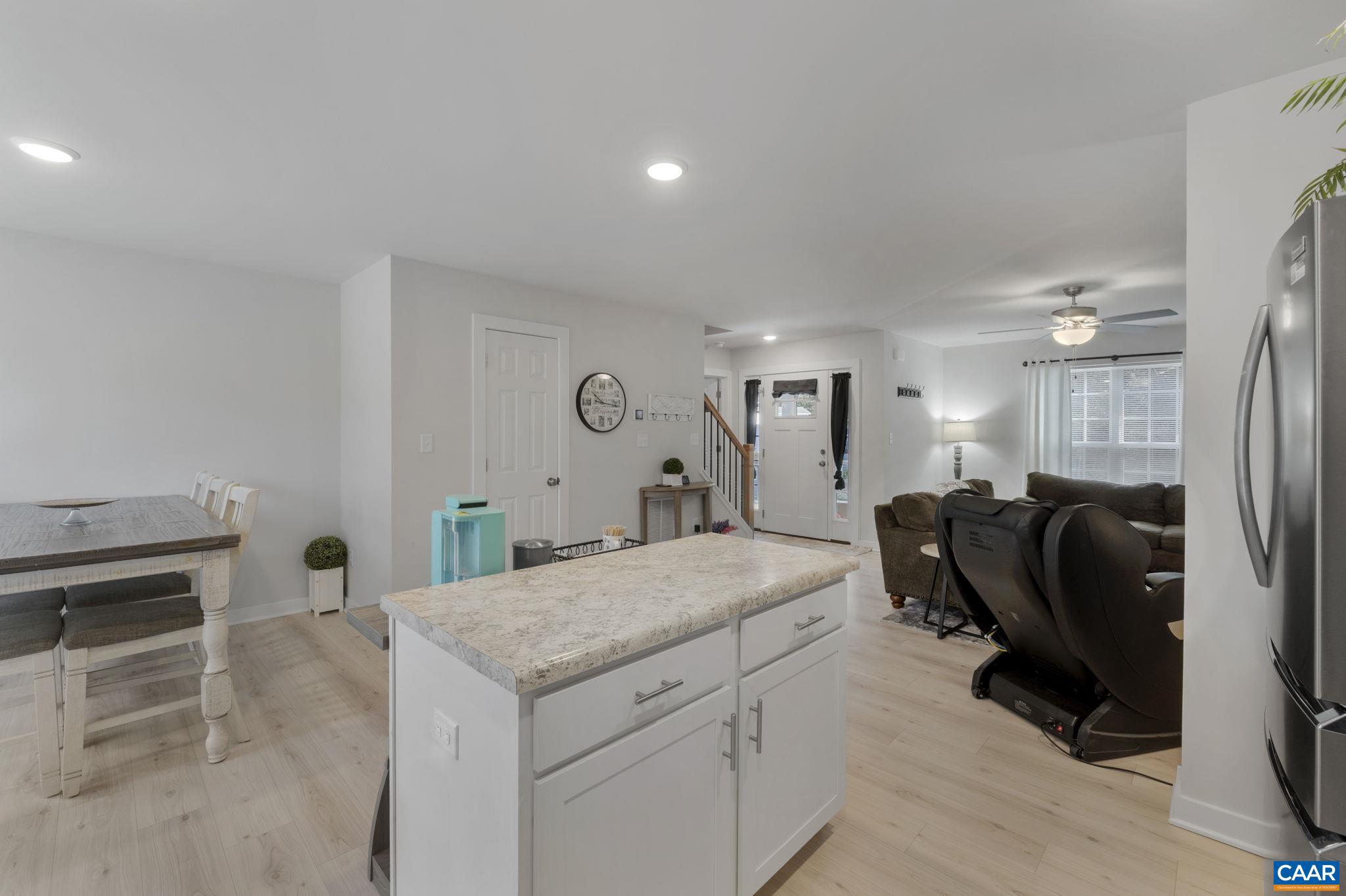 7440 Louisa Road Gordonsville, VA 22942 - Photo 16 of 40 a living room with furniture and a fireplace