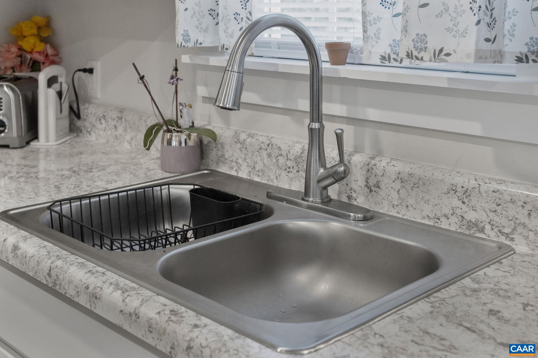 7440 Louisa Road Gordonsville, VA 22942 - Photo 17 of 40 a close view of sink and tap