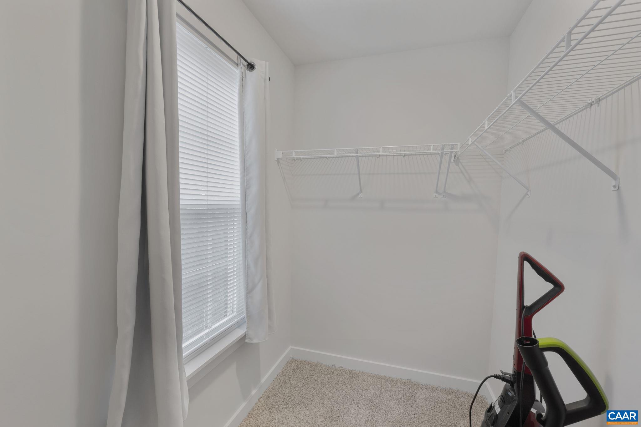 7440 Louisa Road Gordonsville, VA 22942 - Photo 26 of 40 a view of a room with gym equipment