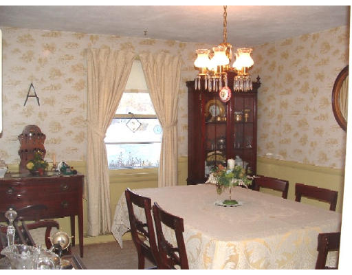 131 Fox Hill Road Springfield, MA 01118 - Photo 3 of 10 a view of a dining room with furniture and chandelier