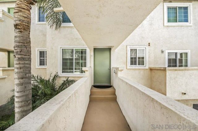 a view of balcony with a potted plant