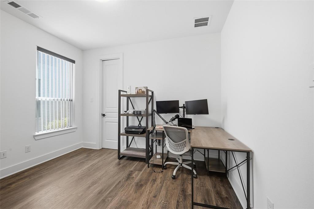 2416 Gallions Road Celina, TX 75009 - Photo 11 of 33 a view of a workspace with furniture and a window