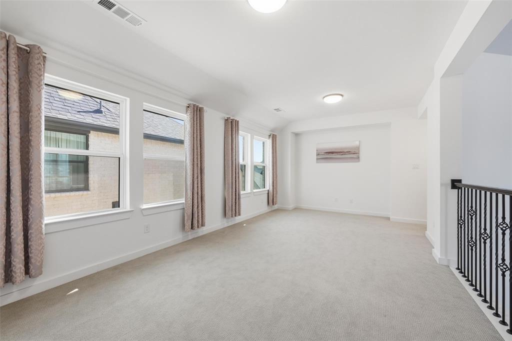 2416 Gallions Road Celina, TX 75009 - Photo 13 of 33 an empty room with windows