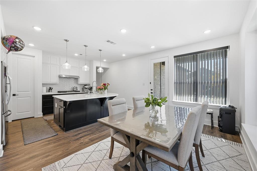2416 Gallions Road Celina, TX 75009 - Photo 5 of 33 a kitchen with a table and chairs in it