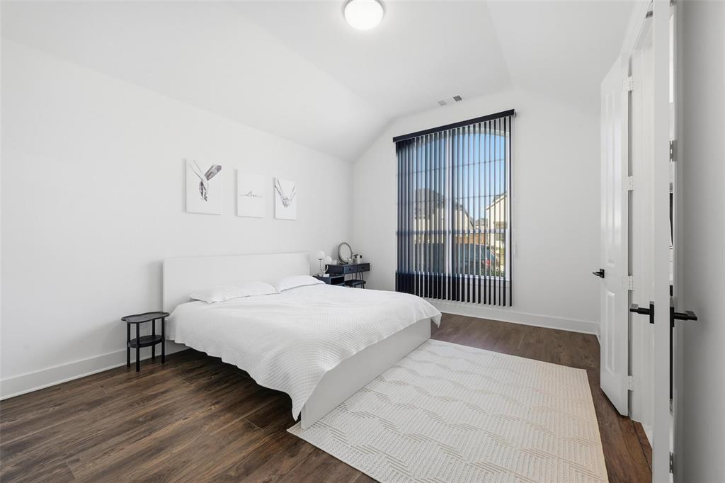 2416 Gallions Road Celina, TX 75009 - Photo 8 of 33 a bedroom with a bed and a window