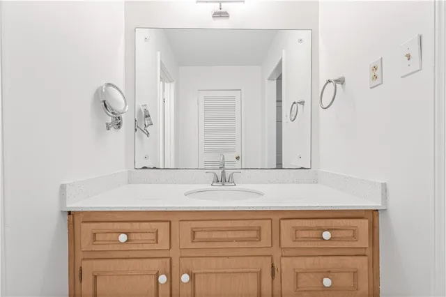 a sink with a mirror