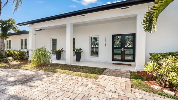 a view of a entryway door front of house
