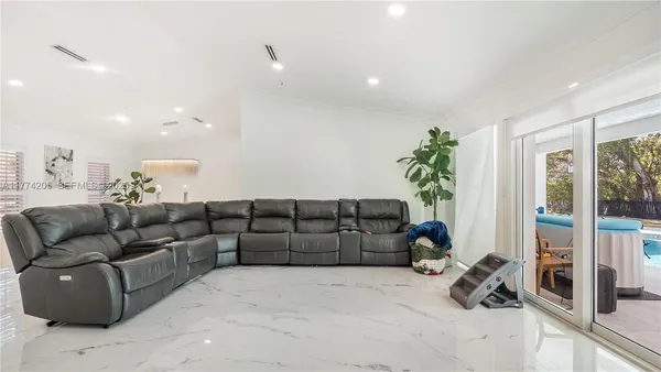 a kitchen with stainless steel appliances white cabinets and a stove