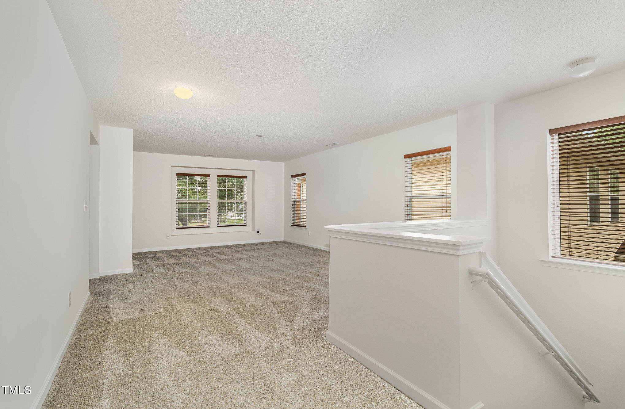 5404 Meryton Park Way Raleigh, NC 27616 - Photo 16 of 35 a view of an empty room with a window
