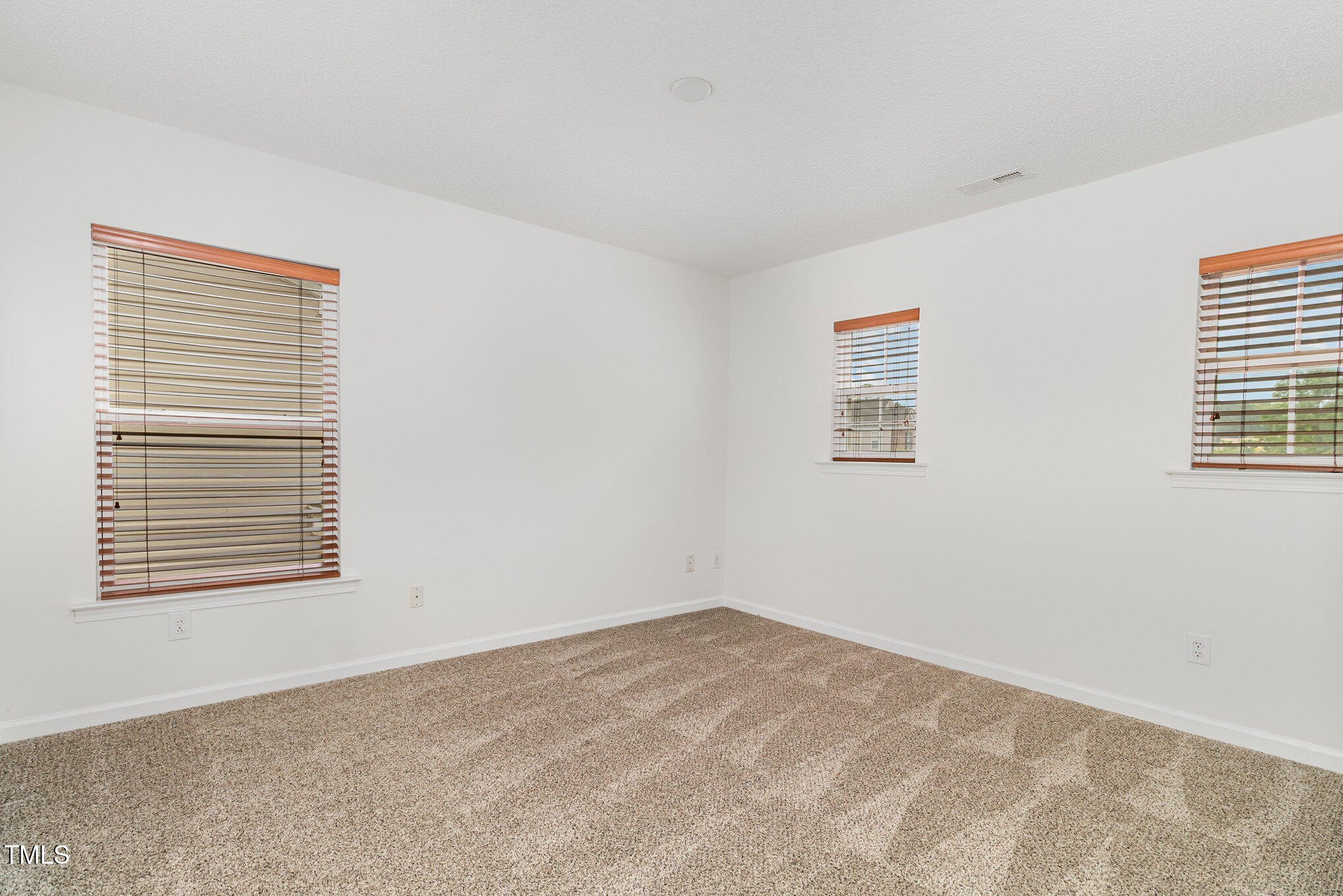 5404 Meryton Park Way Raleigh, NC 27616 - Photo 29 of 35 a view of a room that has a window in it
