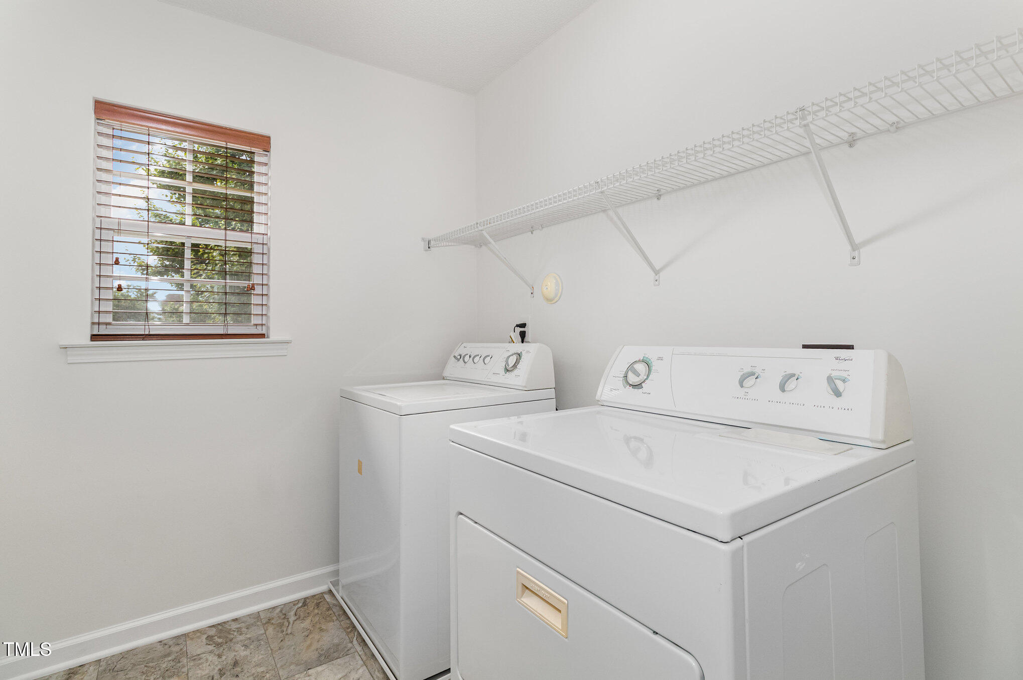 5404 Meryton Park Way Raleigh, NC 27616 - Photo 32 of 35 a utility room with dryer and washer