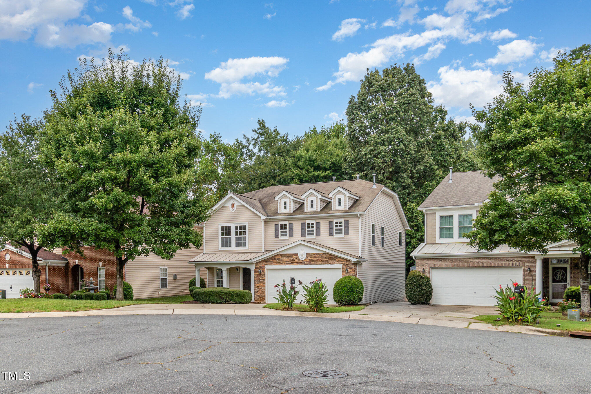 5404 Meryton Park Way Raleigh, NC 27616 - Photo 5 of 35 a front view of a house with a garden