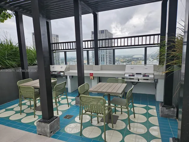 swimming pool view with a outdoor seating