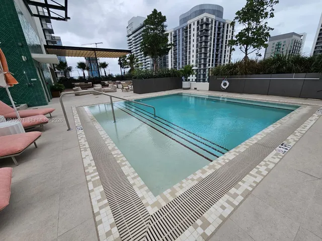 a view of a living room and dining room