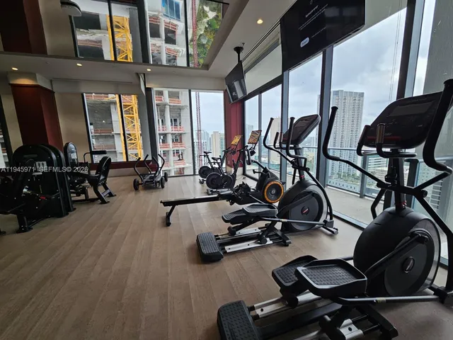 a room with lots of gym equipment